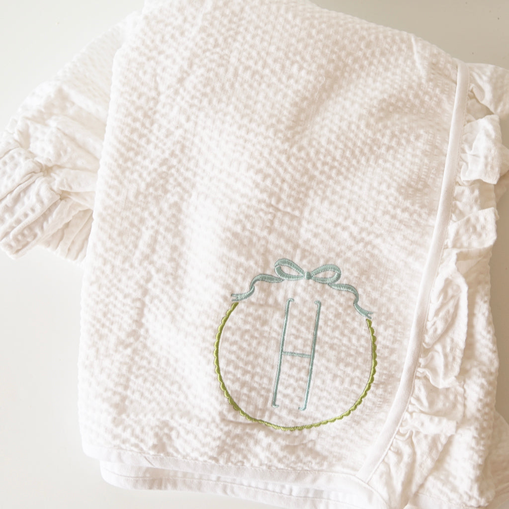 ruffled initial towel wrap