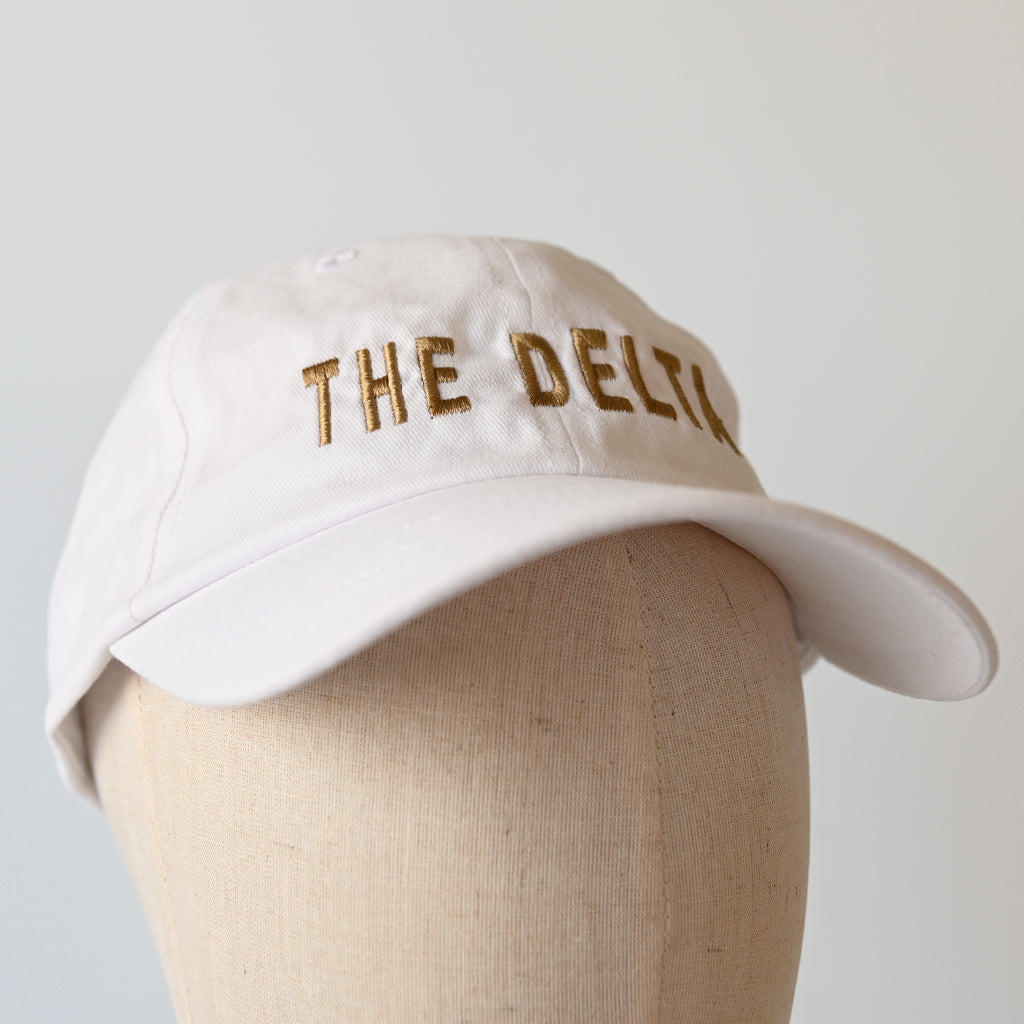 taupe the delta hat